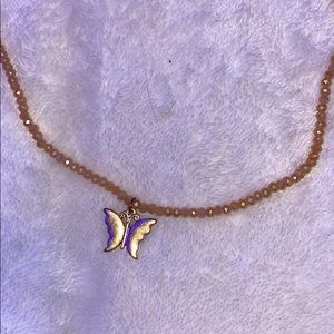 Gold butterfly choker